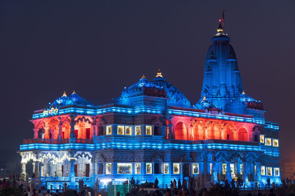 blue and red concrete building during nighttime